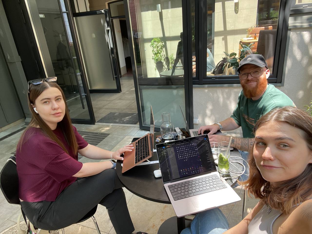 Oleksandr Ratushnyi With the team in the cafe (left – Viktoriia, right – Kate)